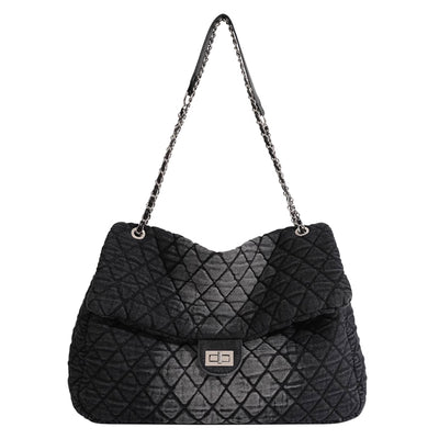 Adrina is a soft woven slouchy bag in plaid pattern is beautifully designed  and effortlessly stylish. The bag is onely Black color. Bag size Dimension: L10cm x W41cm x H26cm. This is a hand bag.