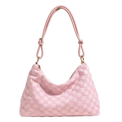 Abby is a soft woven slouchy bag in plaid pattern is beautifully designed and effortlessly stylish. The bag is total 4 color  Light Pink, Blue, Green  and Ivory. Bag size Dimension: L33cm x W11cm x H18c. This is a hand bag.